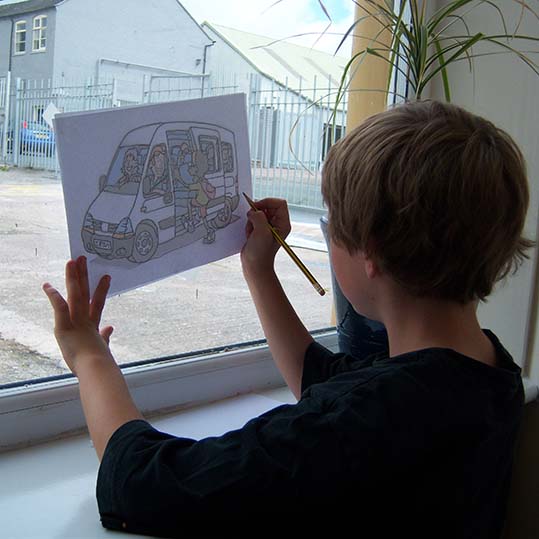 tracing cartoon at closed window